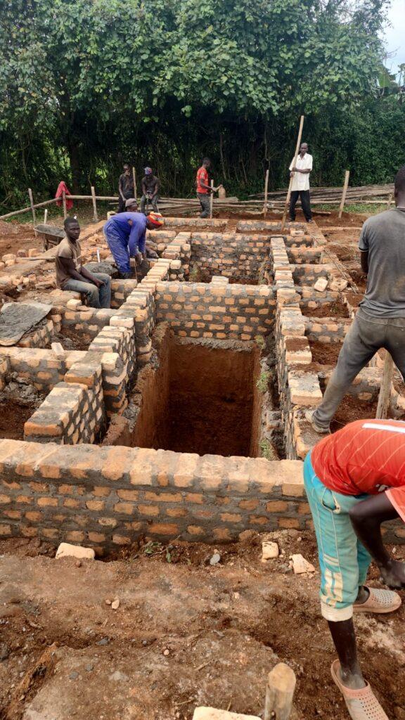 Laying the foundation for YAVINS Education Centre out building